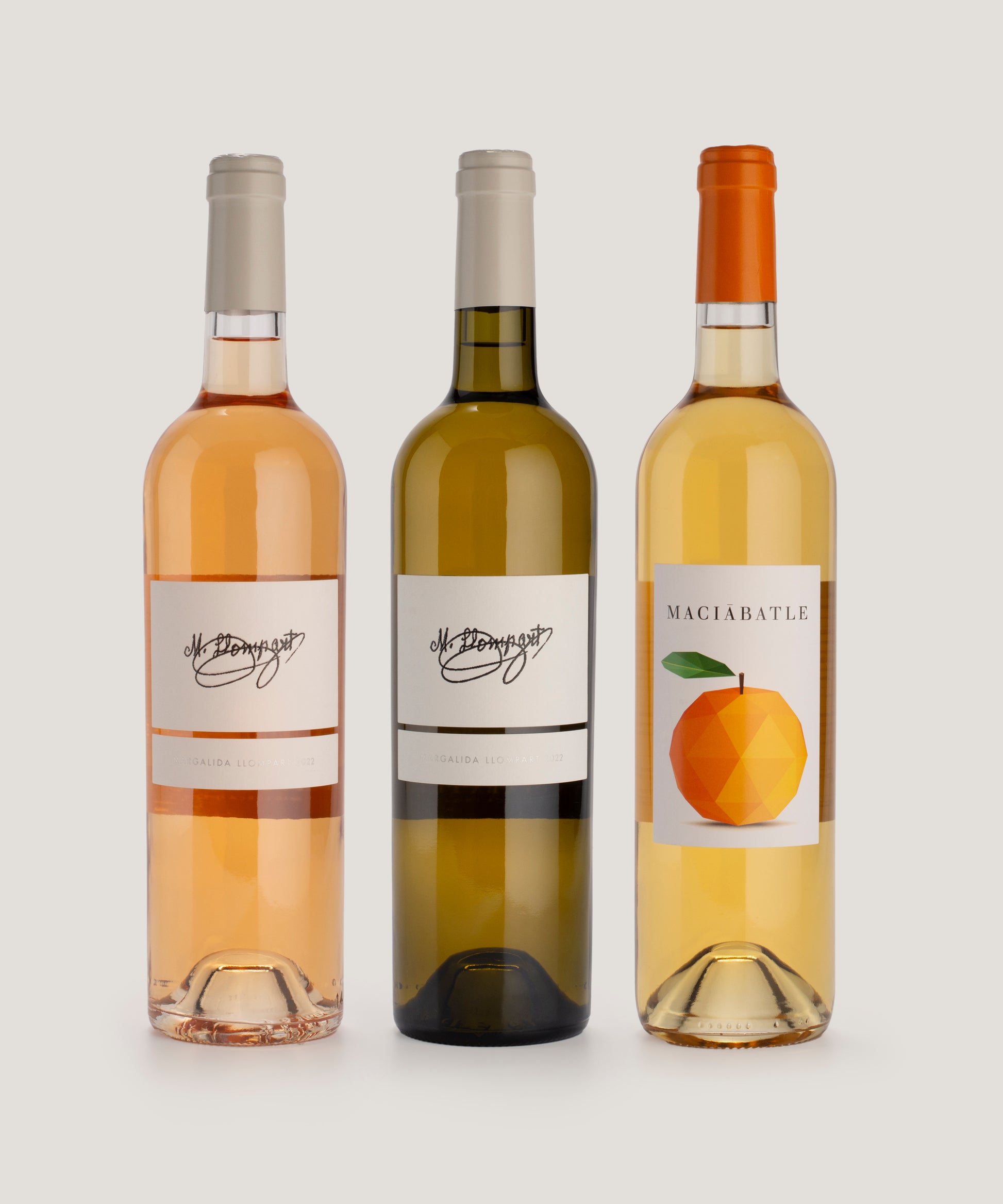 3 bottles of wine, rose, white and orange